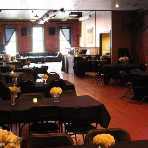Wick's Pizza in New Albany Upstairs Party Room, flower arrangements done by Schulz's Florist